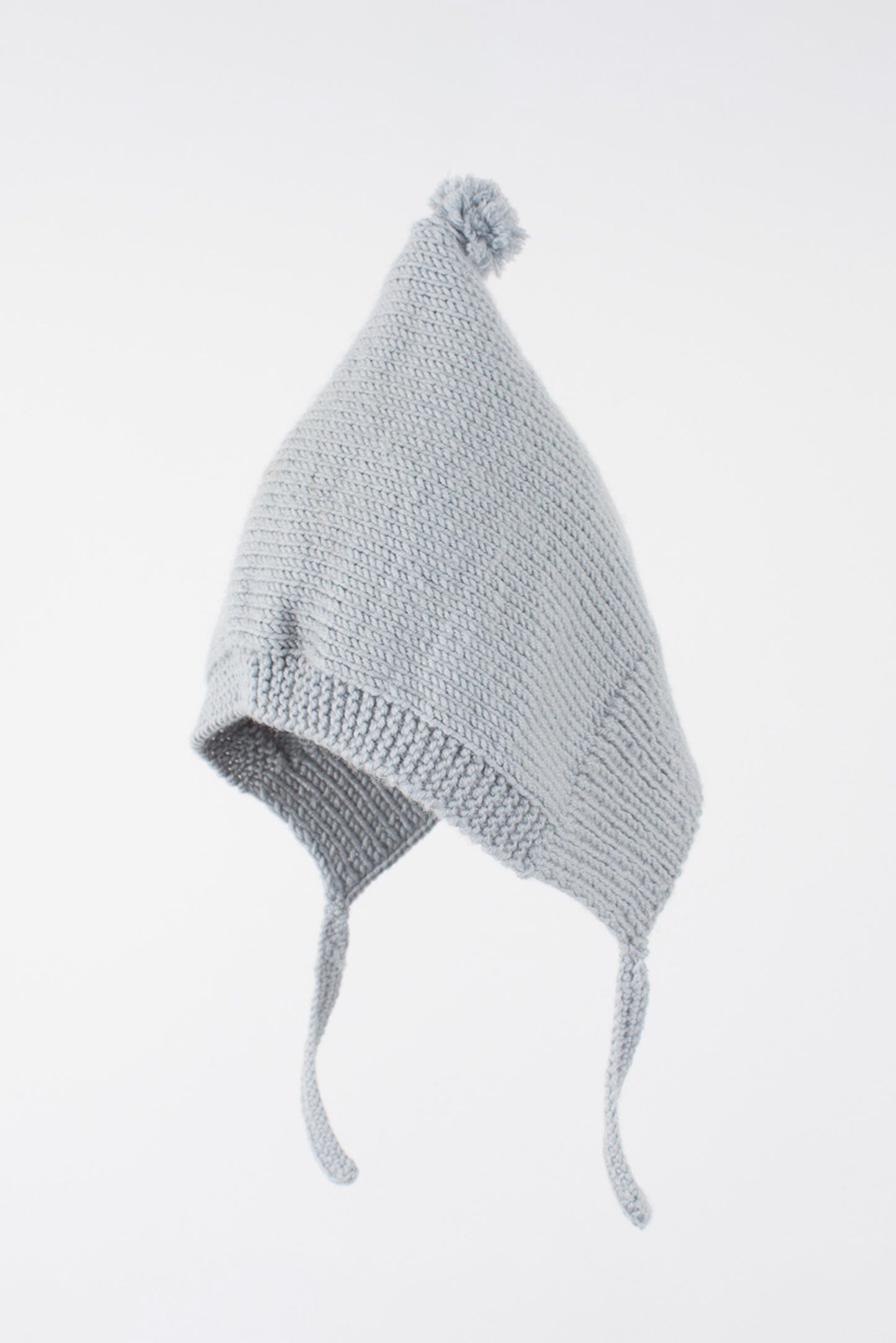 Capote de bebé azul hecha a mano con lana merino, de ÁBBATTE