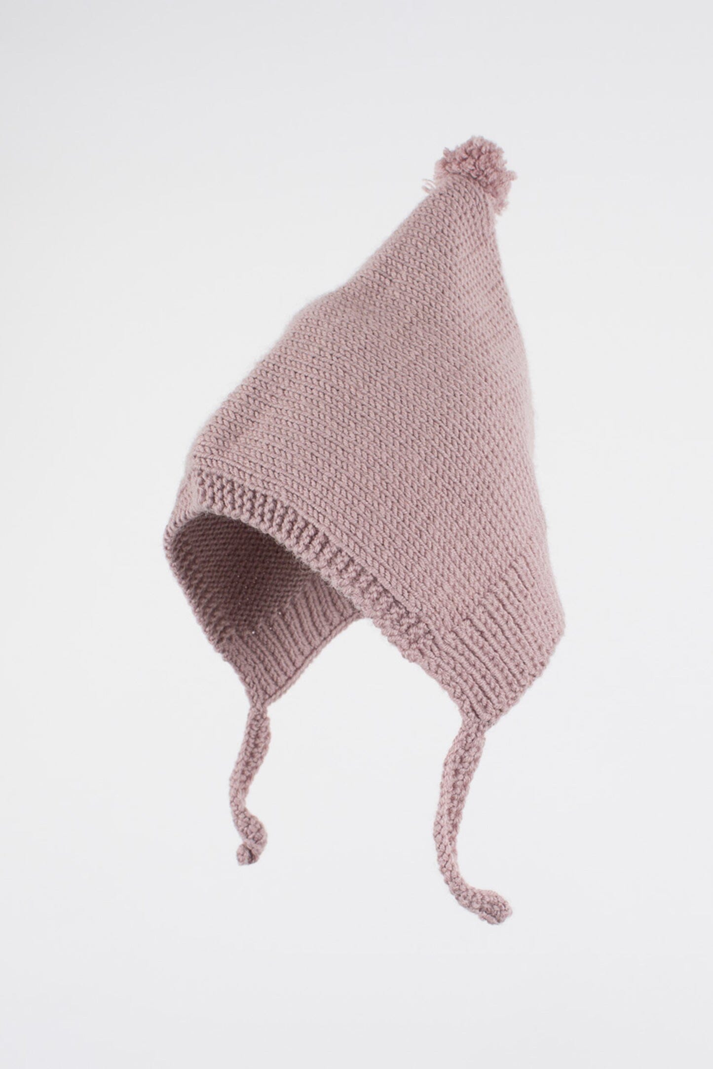 Capota rosa en lana merino hecha a mano en España, de ÁBBATTE