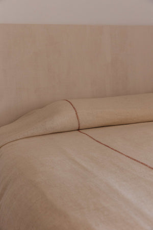 abbatte-colcha-lino-gris-blanco-union-coral