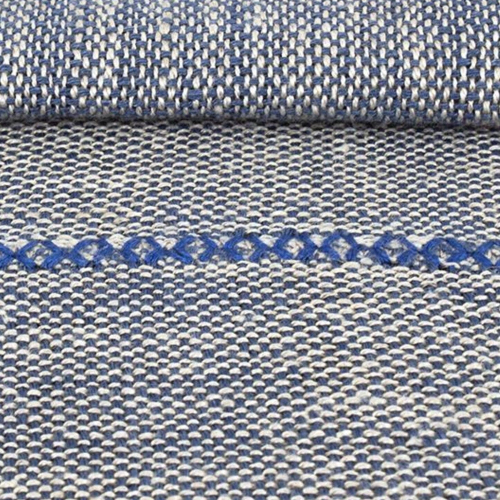 
                  
                    Mantel de lino azul hecho en España por ÁBBATTE
                  
                